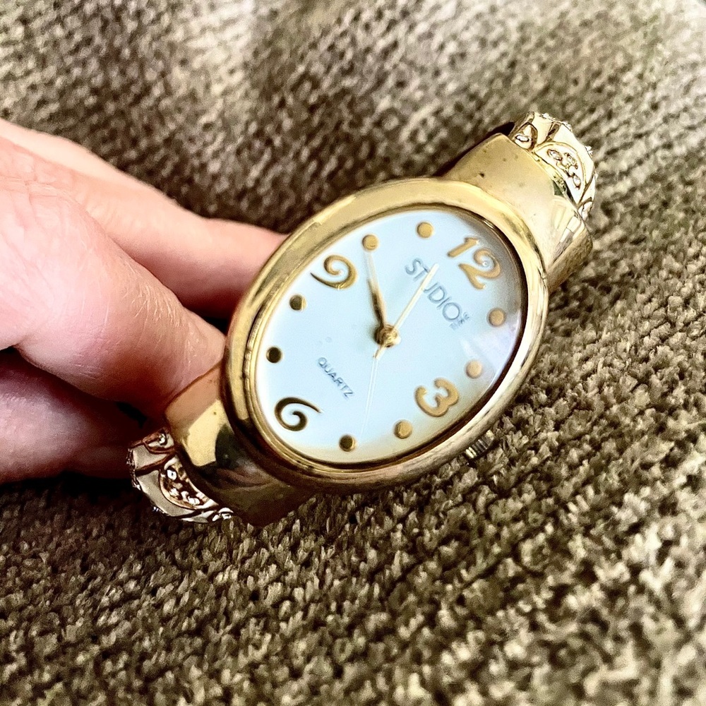 White and gold open cuff watch